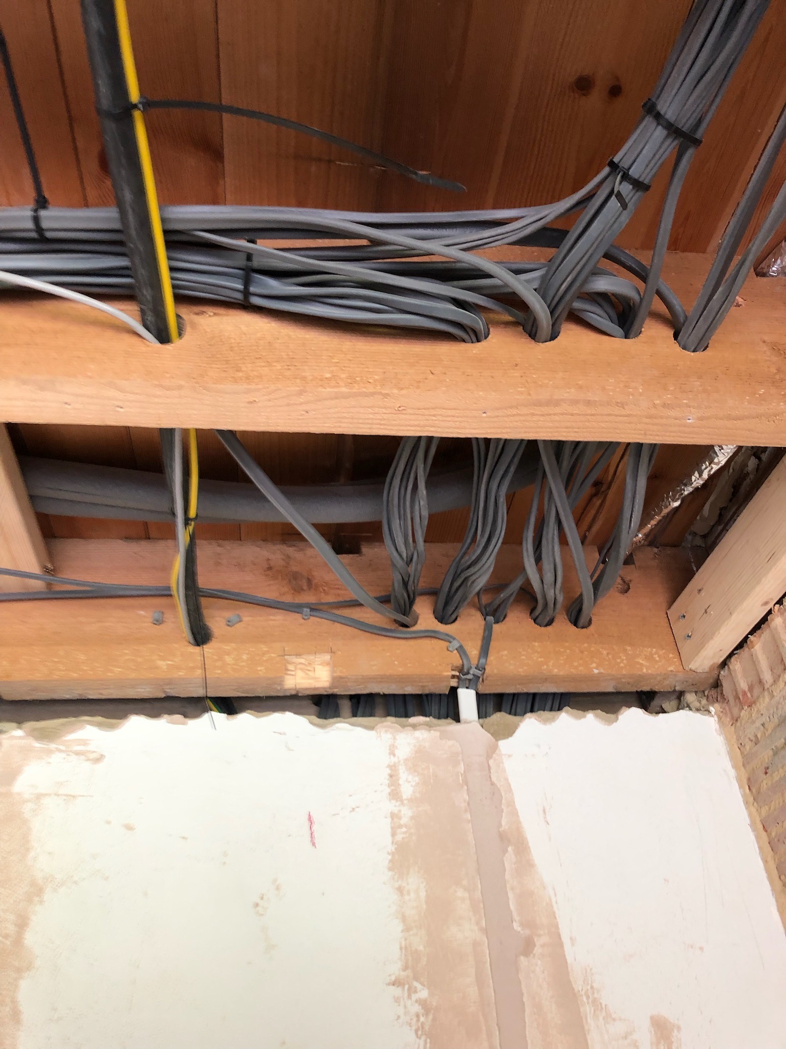 First-fix rewire: new cables run through the floor joists